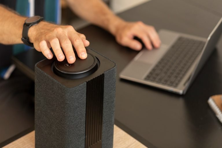 man-using-smart-speaker