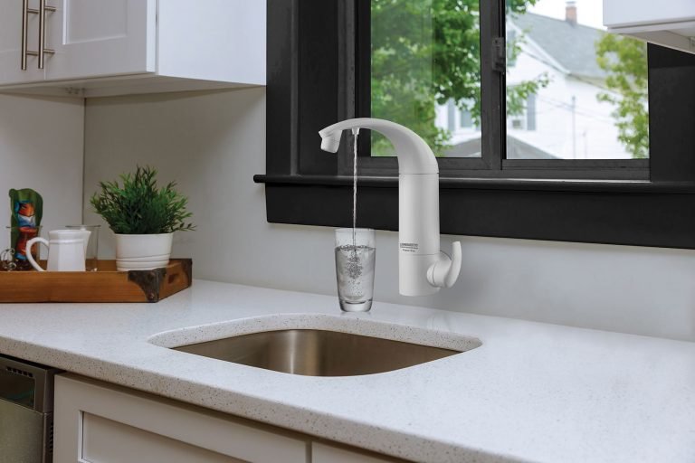 Kitchen Interior with Sink, Cabinets, Stainless Steel in New Luxury Home