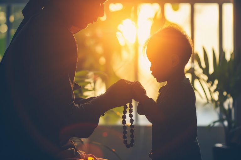 asian-muslim-man-teaching-son-pray-home